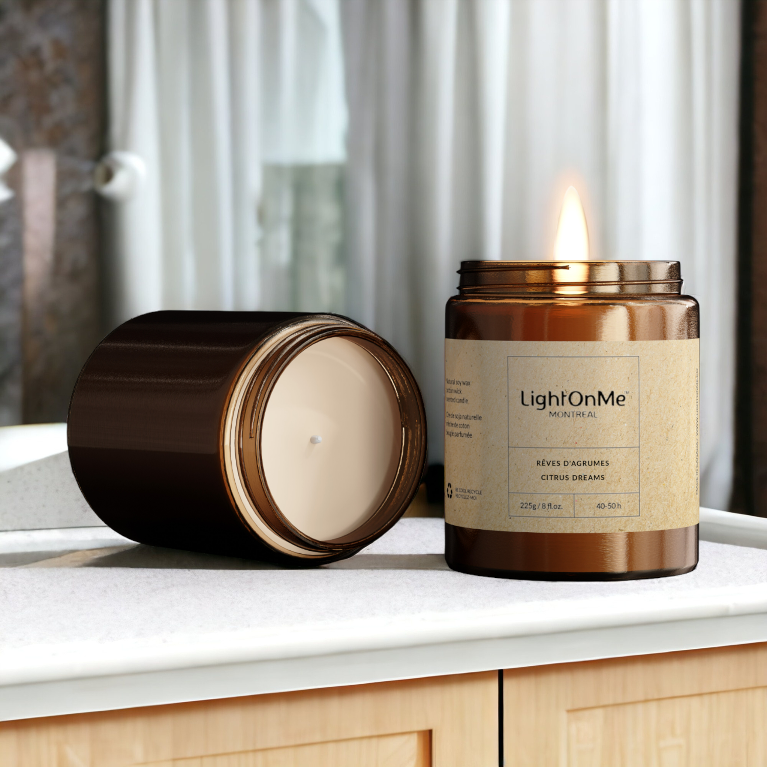 a candle sitting on top of a counter next to a window